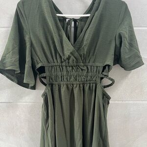 Cute green dress cut out on the sides